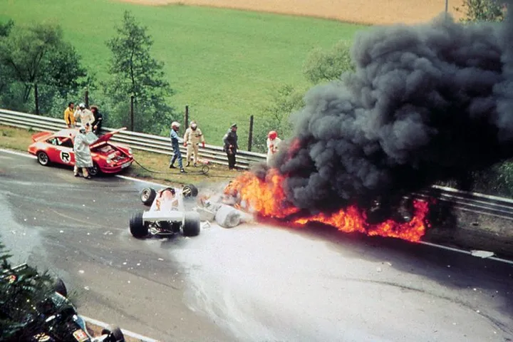 The spectacular crash of World Champion Niki Lauda in todays West German Grand Prix here. After colliding with other cars Lauda's Ferrari caught fire. Niki Lauda was rushed to hospital