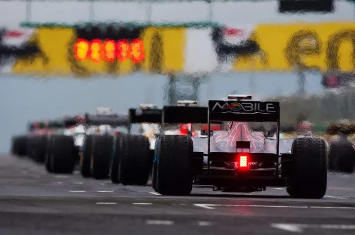 BUDAPEST, HUNGARY - JULY 31:  Sebastien Buemi of Switzerland and Scuderia Toro Rosso lines up at the back of the grid during the Hungarian Formula One Grand Prix at the Hungaroring on July 31, 2011 in Budapest, Hungary.  (Photo by Peter Fox/Getty Images) *** Local Caption *** Sebastien Buemi