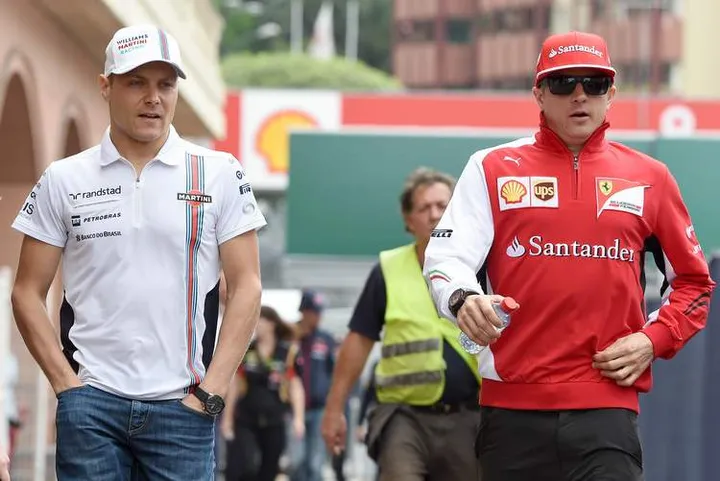 (L to R): Valtteri Bottas (FIN) Williams and Kimi Raikkonen (FIN) Ferrari.Formula One World Championship, Rd6, Monaco Grand Prix, Preparations, Monte-Carlo, Monaco, Wednesday 21 May 2014.