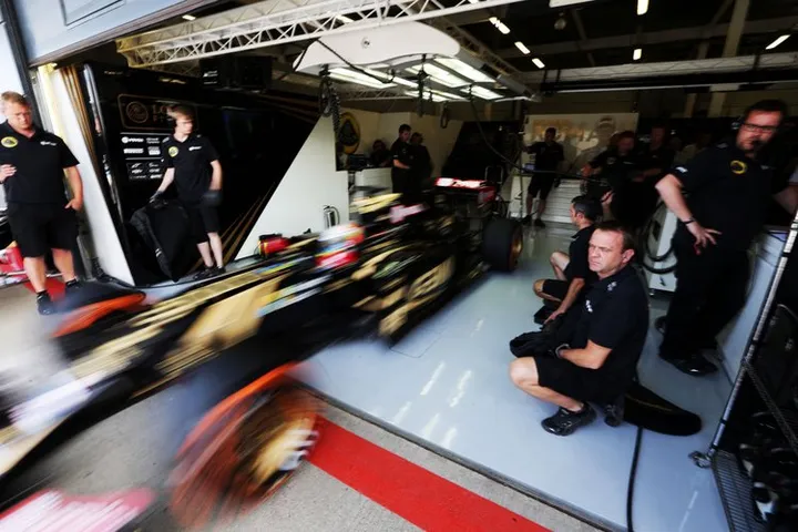 Romain Grosjean (FRA) Lotus F1 E23 leaves the pits. British Grand Prix, Friday 3rd July 2015. Silverstone, England.