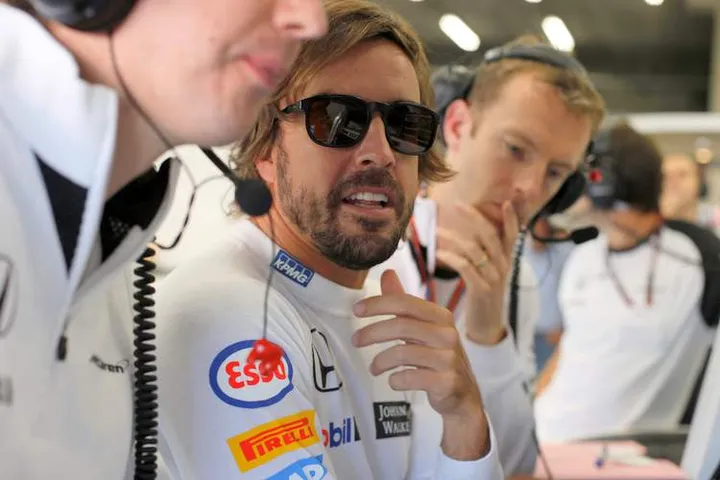 Fernando Alonso in the garage.