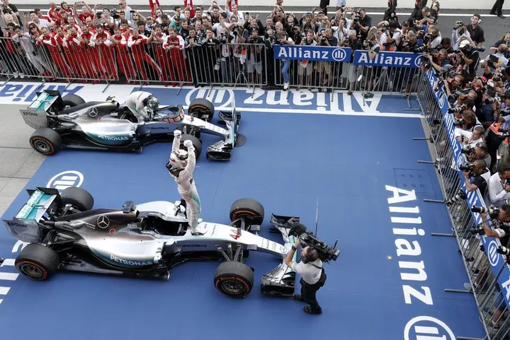 Hamilton Rosberg Suzuka winners Mercedes