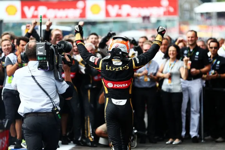 Romain Grosjean (FRA) Lotus F1 Team celebrates his third position with the team at parc ferme.Belgian Grand Prix, Sunday 23rd August 2015. Spa-Francorchamps, Belgium.