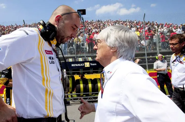 2010 Canadian Grand Prix - Sunday Circuit Gilles Villeneuve, Montreal, Canada 13th June 2010 Gerard Lopez and Bernie Ecclestone World Copyright: Glenn Dunbar/LAT Photographic ref: Digital Image _MG_7869