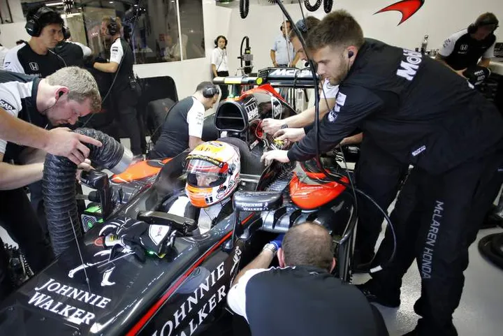 Jenson Button in the garage.