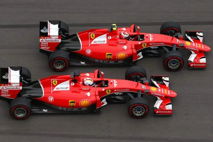 Sebastian+Vettel+Kimi+Raikkonen+F1+Grand+Prix+JYnUYzOfHOSx