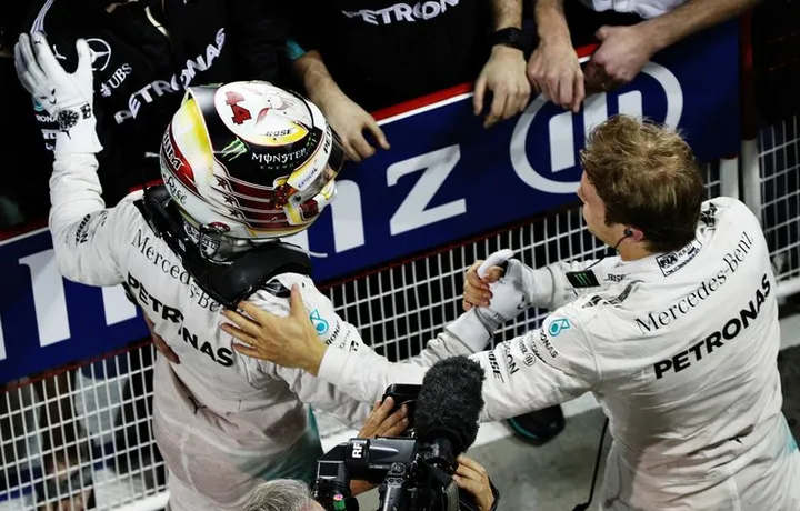 Nico+Rosberg+F1+Grand+Prix+Bahrain+Nico Rosberg of Germany and Mercedes GP is congratulated by Lewis Hamilton