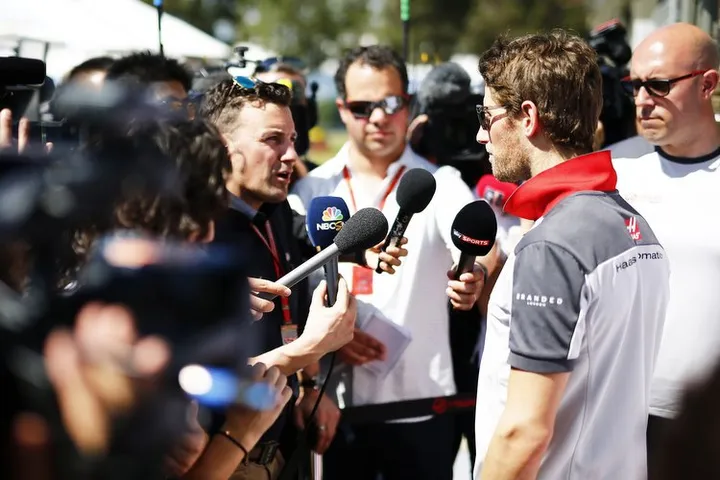 Albert Park, Melbourne, Australia. Thursday 17 March 2016. Romain Grosjean, Haas F1, is interviewed by the media. World Copyright: Andy Hone/LAT Photographic ref: Digital Image _ONY0392