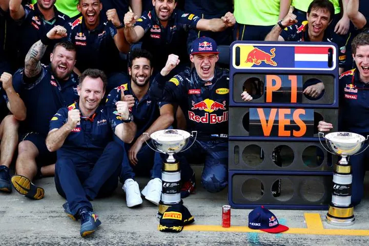 MONTMELO, SPAIN - MAY 15: Max Verstappen of Netherlands and Red Bull Racing celebrates his first F1 win with Daniel Ricciardo of Australia and Red Bull Racing, Red Bull Racing Team Principal Christian Horner and the rest of the Red Bull Racing team during the Spanish Formula One Grand Prix at Circuit de Catalunya on May 15, 2016 in Montmelo, Spain. (Photo by Clive Mason/Getty Images) // Getty Images / Red Bull Content Pool // P-20160515-01469 // Usage for editorial use only // Please go to www.redbullcontentpool.com for further information. //