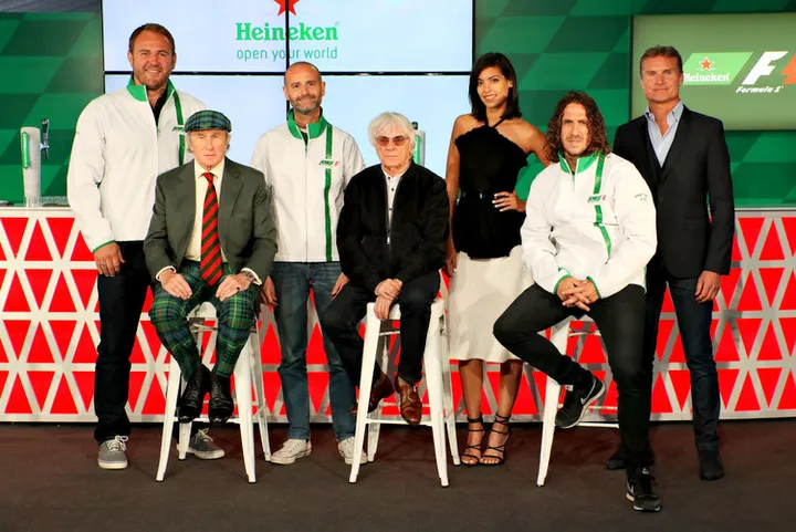 MONTREAL, QC - JUNE 09: Heineken announces global partnership with Formula One Management. F1 supremo Bernie Ecclestone, centre, joins Gianluca Di Tondo, Senior Director Global Heineken Brand and Heineken ambassadors (left to right) Scott Quinnell, Sir Jackie Stewart, Stephanie Sigman, Carles Puyol and David Coulthard during previews to the Canadian Formula One Grand Prix at Circuit Gilles Villeneuve on June 9, 2016 in Montreal, Canada.  (Photo by Mark Thompson/Getty Images)