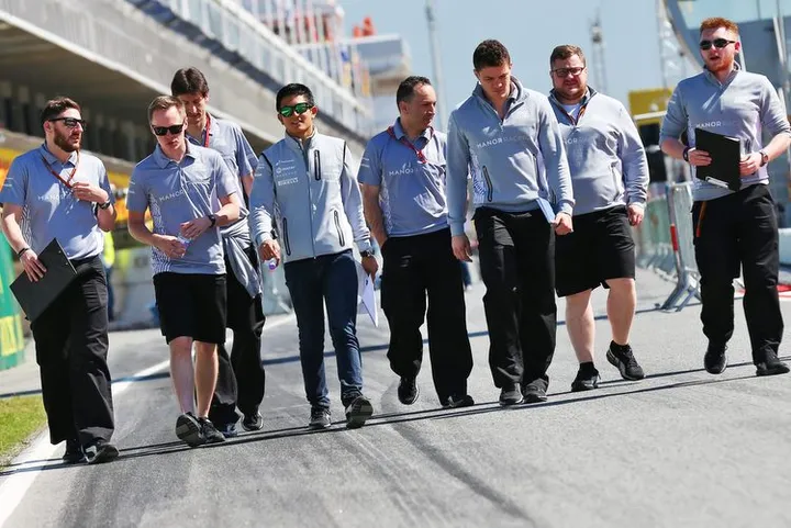 Rio Haryanto (IDN) Manor Racing walks the circuit with the team. 12.05.2016. Formula 1 World Championship, Rd 5, Spanish Grand Prix, Barcelona, Spain, Preparation Day.