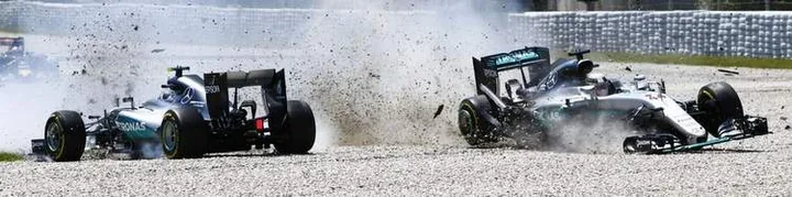 Lewis-Hamilton-and-Nico-Rosberg-crash-at-Spanish-Grand-Prix