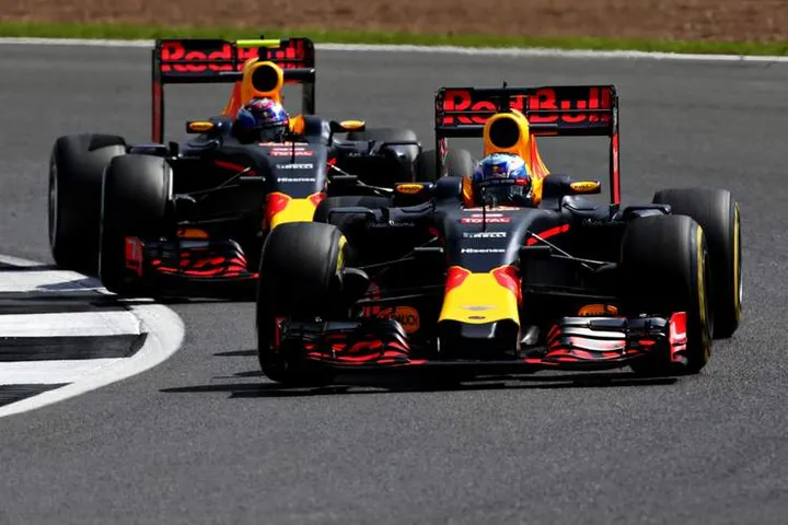 NORTHAMPTON, ENGLAND - JULY 08:  Daniel Ricciardo of Australia driving the (3) Red Bull Racing Red Bull-TAG Heuer RB12 TAG Heuer leads Max Verstappen of the Netherlands driving the (33) Red Bull Racing Red Bull-TAG Heuer RB12 TAG Heuer on track during practice for the Formula One Grand Prix of Great Britain at Silverstone on July 8, 2016 in Northampton, England.  (Photo by Charles Coates/Getty Images) // Getty Images / Red Bull Content Pool  // P-20160708-01165 // Usage for editorial use only // Please go to www.redbullcontentpool.com for further information. //