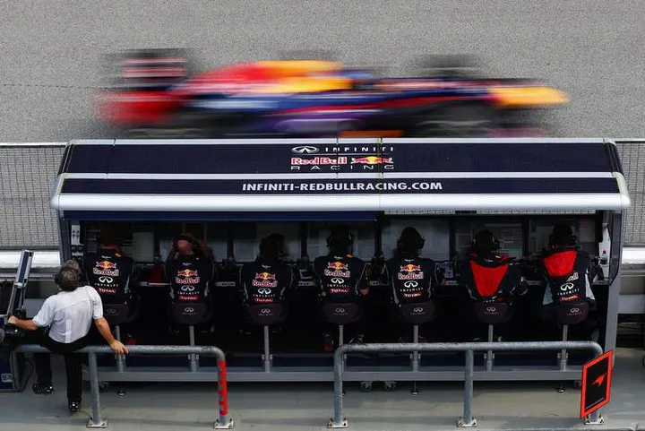 KUALA LUMPUR, MALAYSIA - MARCH 24: Sebastian Vettel of Germany and Infiniti Red Bull Racing passes his team pitwall during the Malaysian Formula One Grand Prix at the Sepang Circuit on March 24, 2013 in Kuala Lumpur, Malaysia. (Photo by Paul Gilham/Getty Images) Formula 1 Data and STEM Education: A Statistical Approach Sebastian Vettel