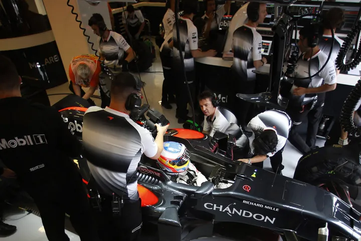 Fernando Alonso in the garage.