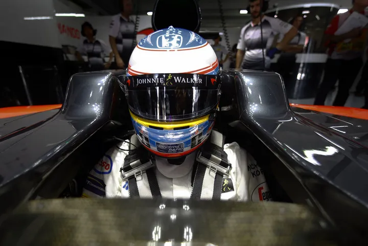 Fernando Alonso, McLaren, in cockpit.