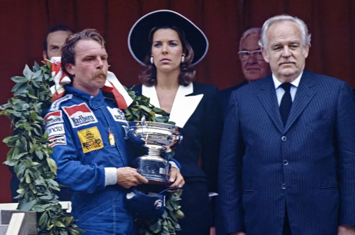 Monte Carlo, Monaco, 12th - 15th May 1983, RD5. Keke Rosberg on the podium after his victory in the race. Portrait. Podium. Photo: LAT Photographic/Williams F1. Ref: 1983williams04