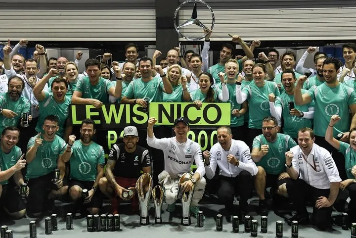 rosberg hamilton mercedes celebrate singapore