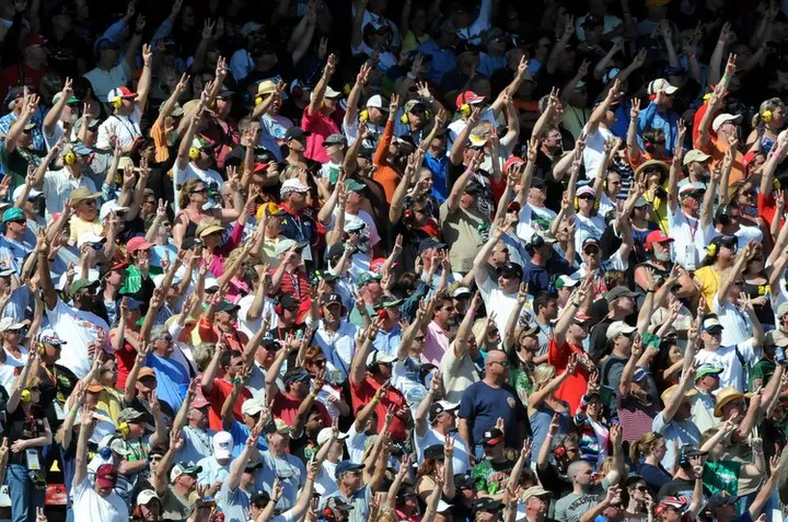 fans holding 3 fingers in 2011 daytona 500 in honor for dale earnhardt