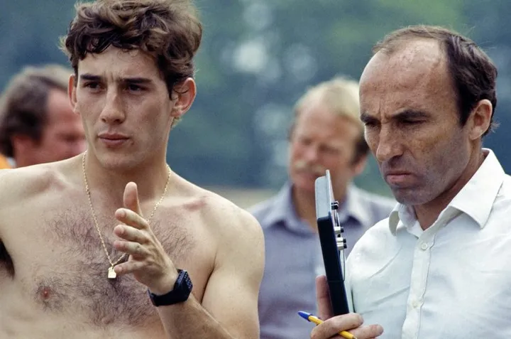 Donington Park, England, 1983. Sir Frank with Ayrton Senna. Portrait. Photo: LAT Photographic/Williams F1. Ref: 1983williams06