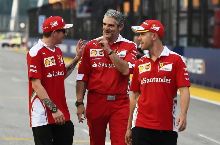 Kimi Raikkonen (FIN) Ferrari, Maurizio Arrivabene (ITA) Ferrari Team Principal and Sebastian Vettel (GER) Ferrari walk the track at Formula One World Championship, Rd15, Singapore Grand Prix, Preparations, Marina Bay Street Circuit, Singapore, Thursday 15 September 2016.