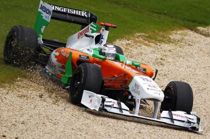 Adrian Sutil (GER) Force India F1 VJM04 runs wide. Formula One World Championship, Rd 1, Australian Grand Prix, Practice Day, Albert Park, Melbourne, Australia, Friday 25 March 2011.