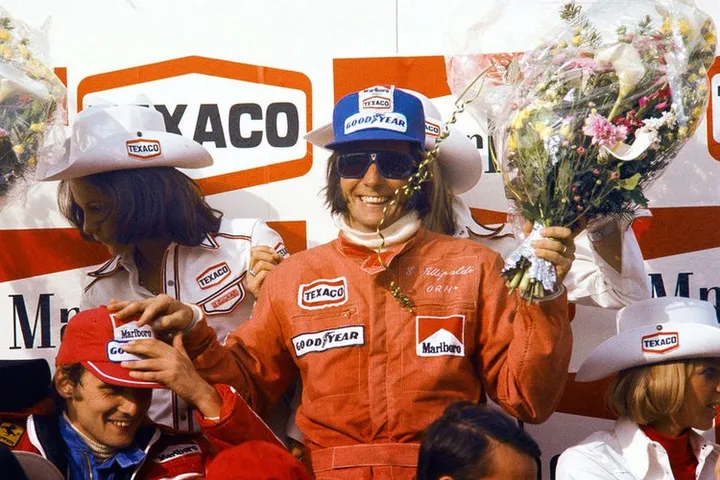 niki_lauda___emerson_fittipaldi__belgium_1974__by_f1_history-d6bzm7s