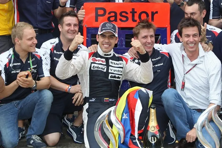 Circuit de Catalunya, Barcelona, Spain 13th May 2012 Pastor Maldonado, Williams F1 Team celebrates with Toto Wolff, Sir Frank Williams, Team Principal, Williams F1 and the rest of the team after winning the race. World Copyright:Glenn Dunbar/LAT Photographic ref: Digital Image CG8C5915