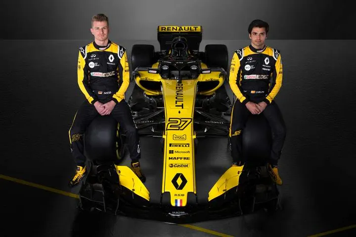 (L to R): Nico Hulkenberg (GER) Renault Sport F1 Team with Carlos Sainz Jr (ESP) Renault Sport F1 Team.Renault Sport Formula One Team RS18 Launch, Enstone, England. Tuesday 20th February 2018.