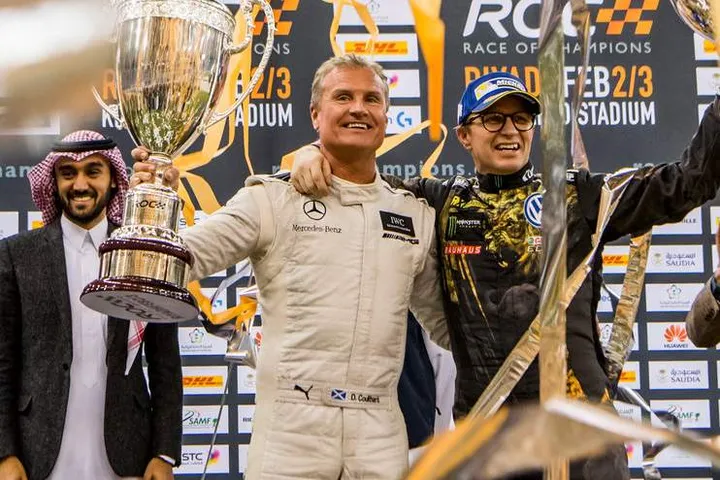 Winner David Coulthard (GBR) and runner up Petter Solberg (NOR) celebrate on the podium during the Race of Champions on Saturday 3 February 2018 at King Fahad Stadium, Riyadh, Saudi Arabia._596