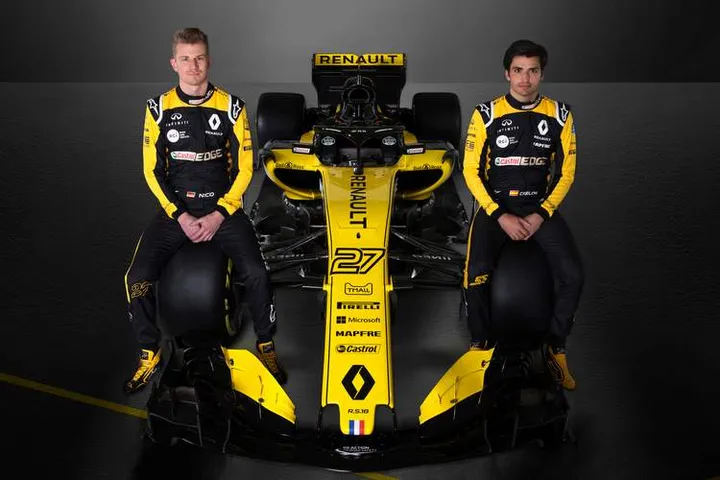 (L to R): Nico Hulkenberg (GER) Renault Sport F1 Team with Carlos Sainz Jr (ESP) Renault Sport F1 Team.Renault Sport Formula One Team RS18 Launch, Enstone, England. Tuesday 20th February 2018.