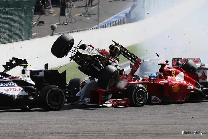 SPA, BELGIUM - SEPTEMBER 02: In this sequence of ten frames Romain Grosjean of France and Lotus is seen being catapulted into the air as he crashes at the first corner at the start of the Belgian Grand Prix at the Circuit of Spa Francorchamps on September 2, 2012 in Spa Francorchamps, Belgium. (Photo by Mark Thompson/Getty Images)