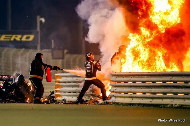 romain-grosjean-getting-out-of-his-car-that-is-on-fire-at-bahrain-gp-2020