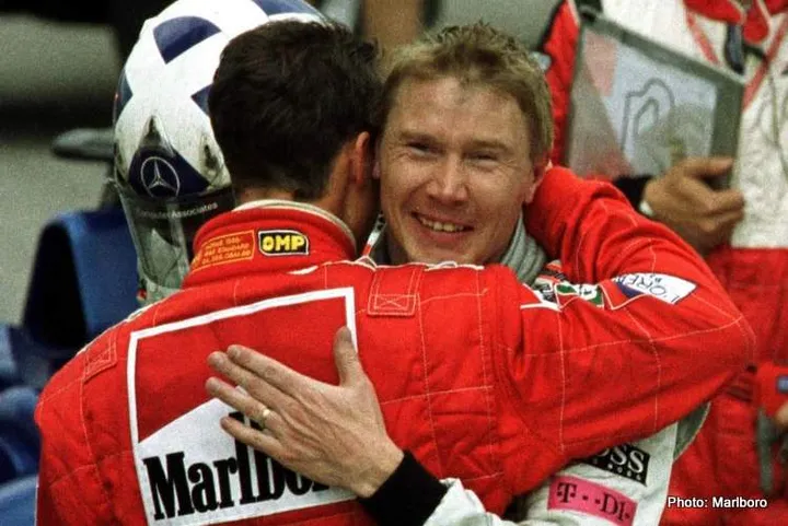 shcumacher hakkinen embrace F1 rivalry