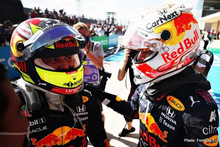 Max Verstappen and Sergio Perez celebrate their 2021 US GP