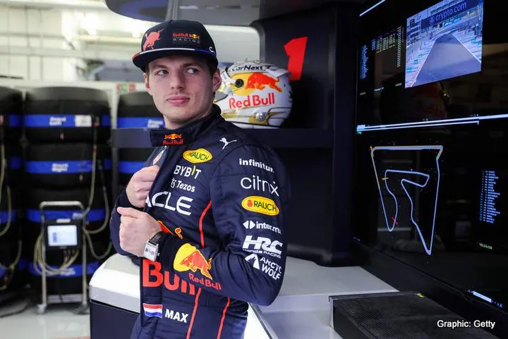 BAHRAIN, BAHRAIN - MARCH 10: Max Verstappen of the Netherlands and Oracle Red Bull Racing looks on in the garage during Day One of F1 Testing at Bahrain International Circuit on March 10, 2022 in Bahrain, Bahrain. (Photo by Mark Thompson/Getty Images)