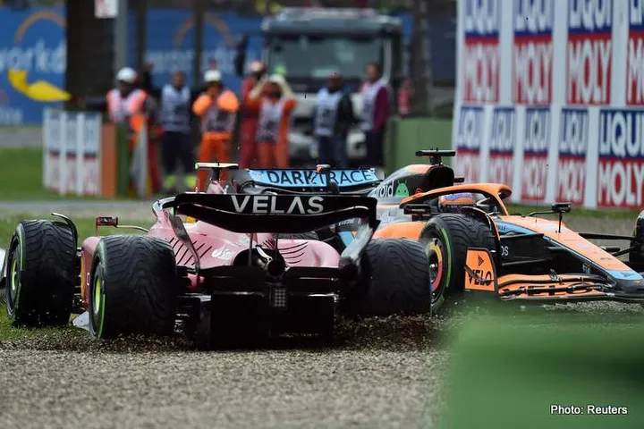 sainz ricciardo crash Formula One F1 - Emilia Romagna Grand Prix - Autodromo Enzo e Dino Ferrari, Imola, Italy - April 24, 2022 Ferrari's Carlos Sainz Jr. and McLaren's Daniel Ricciardo after they crashed out of the race REUTERS/Massimo Pinca