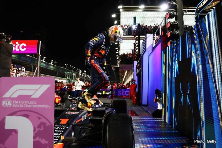 JEDDAH, SAUDI ARABIA - MARCH 27: Race winner Max Verstappen of the Netherlands and Oracle Red Bull Racing celebrates in parc ferme during the Grand Prix of Saudi Arabia at the Jeddah Corniche Circuit on March 27, 2022 in Jeddah, Saudi Arabia. (Photo by Mark Thompson/Getty Images)