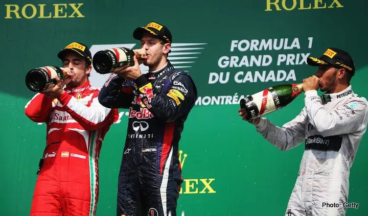 monaco grand prix MONTREAL, QC - JUNE 09: Sebastian Vettel (centre) of Germany and Infiniti Red Bull Racing celebrates with second placed Fernando Alonso (left) of Spain and Ferrari and third placed Lewis Hamilton (right) of Great Britain and Mercedes GP following the Canadian Formula One Grand Prix at the Circuit Gilles Villeneuve on June 9, 2013 in Montreal, Canada. (Photo by Mark Thompson/Getty Images) *** Local Caption *** Sebastian Vettel; Fernando Alonso; Lewis Hamilton