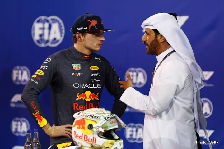 BAHRAIN, BAHRAIN - MARCH 19: Second place qualifier Max Verstappen of the Netherlands and Oracle Red Bull Racing talks with Mohammed ben Sulayem, FIA President, in parc ferme during qualifying ahead of the F1 Grand Prix of Bahrain at Bahrain International Circuit on March 19, 2022 in Bahrain, Bahrain. (Photo by Lars Baron/Getty Images)