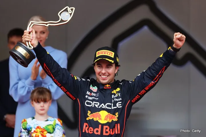 MONTE-CARLO, MONACO - MAY 29: Race winner Sergio Perez of Mexico and Oracle Red Bull Racing celebrates on the podium during the F1 Grand Prix of Monaco at Circuit de Monaco on May 29, 2022 in Monte-Carlo, Monaco. (Photo by Clive Rose/Getty Images)