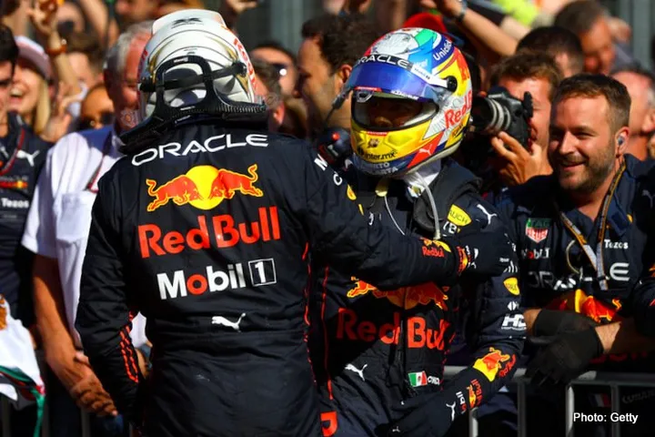BAKU, AZERBAIJAN - JUNE 12: Race winner Max Verstappen of the Netherlands and Oracle Red Bull Racing and Second placed Sergio Perez of Mexico and Oracle Red Bull Racing celebrate in parc ferme during the F1 Grand Prix of Azerbaijan at Baku City Circuit on June 12, 2022 in Baku, Azerbaijan. (Photo by Mark Thompson/Getty Images)