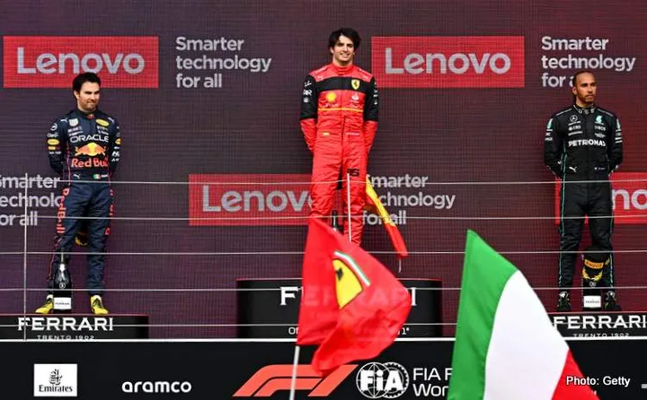 NORTHAMPTON, ENGLAND - JULY 03: Race winner Carlos Sainz of Spain and Ferrari, Second placed Sergio Perez of Mexico and Oracle Red Bull Racing and Third placed Lewis Hamilton of Great Britain and Mercedes celebrate on the podium during the F1 Grand Prix of Great Britain at Silverstone on July 03, 2022 in Northampton, England. (Photo by Clive Mason/Getty Images) binotto interview sainz