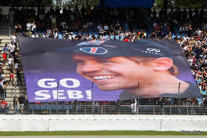 HOCKENHEIM, GERMANY - JULY 22:  Fans unfurl a giant banner in support of Sebastian Vettel of Germany and Red Bull Racing during the German Grand Prix at Hockenheimring on July 22, 2012 in Hockenheim, Germany.  (Photo by Ker Robertson/Getty Images) *** Local Caption *** Sebastian Vettel
