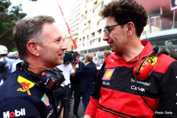 MONTE-CARLO, MONACO - MAY 29: Red Bull Racing Team Principal Christian Horner talks with Scuderia Ferrari Team Principal Mattia Binotto on the grid ahead of the F1 Grand Prix of Monaco at Circuit de Monaco on May 29, 2022 in Monte-Carlo, Monaco. (Photo by Mark Thompson/Getty Images)