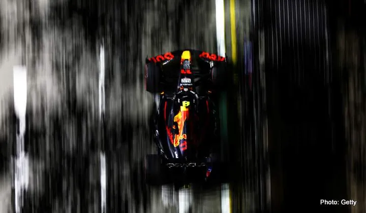 SINGAPORE, SINGAPORE - SEPTEMBER 30: Sergio Perez of Mexico driving the (11) Oracle Red Bull Racing RB18 on track during practice ahead of the F1 Grand Prix of Singapore at Marina Bay Street Circuit on September 30, 2022 in Singapore, Singapore. (Photo by Clive Rose/Getty Images,)