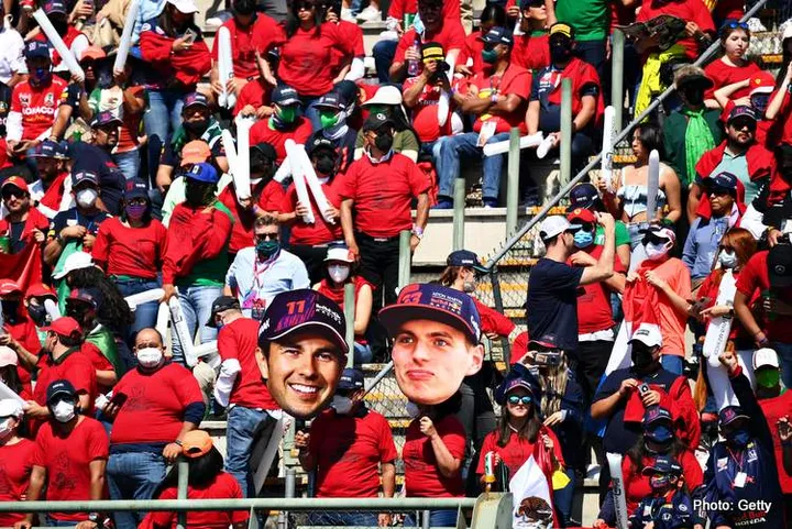 MEXICO CITY, MEXICO - NOVEMBER 07: Red Bull Racing fans show their support before the F1 Grand Prix of Mexico at Autodromo Hermanos Rodriguez on November 07, 2021 in Mexico City, Mexico. (Photo by Clive Mason/Getty Images)