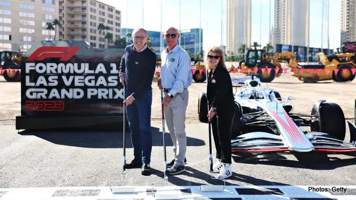 LAS VEGAS, NEVADA - NOVEMBER 05: Greg Maffei, Liberty Media President and CEO, Stefano Domenicali, President and CEO of Formula 1 and Renee Wilm, CEO of the Las Vegas Grand Prix pose for a photograph after painting the start line during the Formula 1 Las Vegas Grand Prix 2023 launch party on November 05, 2022 on the Las Vegas Strip in Las Vegas, Nevada. (Photo by Dan Istitene - Formula 1/Formula 1 via Getty Images)