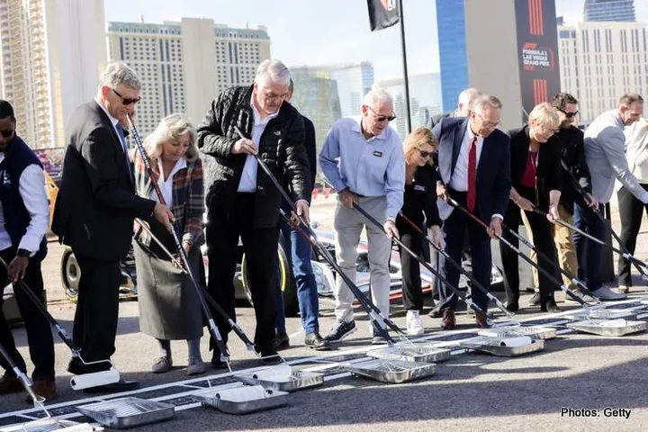 LAS VEGAS, NEVADA - NOVEMBER 05: Greg Maffei, Liberty Media President and CEO, Stefano Domenicali, President and CEO of Formula 1, Steven Sisolak, Governor of Nevada, Jim Gibson, Clark County Commission Chair and delegates paint the start line during the Formula 1 Las Vegas Grand Prix 2023 launch party on November 05, 2022 on the Las Vegas Strip in Las Vegas, Nevada. (Photo by Greg Doherty - Formula 1/Formula 1 via Getty Images)