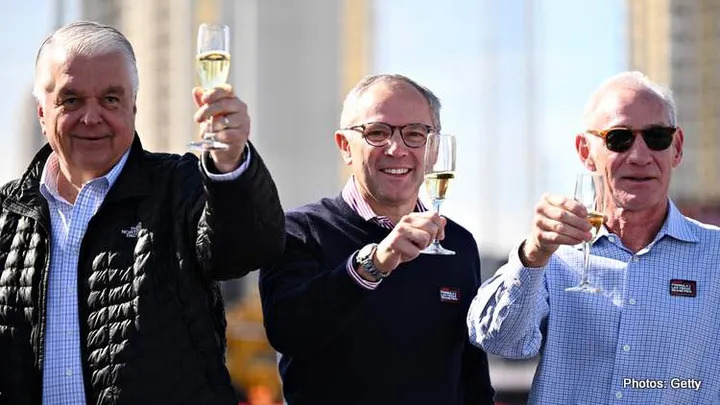 LAS VEGAS, NEVADA - NOVEMBER 05: Greg Maffei, Liberty Media President and CEO, Stefano Domenicali, President and CEO of Formula 1 and Steven Sisolak, Governor of Nevada pose for a photograph after painting the start line during the Formula 1 Las Vegas Grand Prix 2023 launch party on November 05, 2022 on the Las Vegas Strip in Las Vegas, Nevada. (Photo by Clive Mason - Formula 1/Formula 1 via Getty Images)